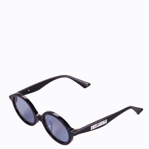 Poppy Lissiman Black Round Sunglasses
